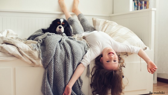 child on bed