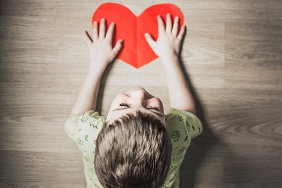 boy with paper heart