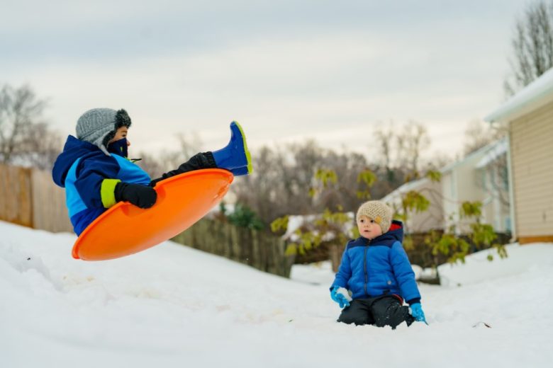 boys sledding